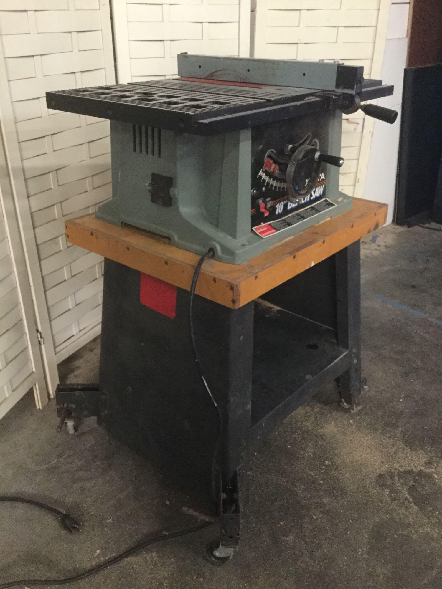 Delta 10 inch Bench Saw , model no. 36-540 Type2, mounted on rolling stand