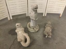 Collection of three otter yard statue/ fountain heads