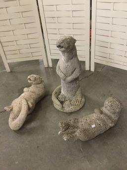 Collection of three otter yard statue/ fountain heads
