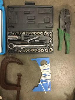 Collection of tools: Sea Fit multi tool kit, Clinch Fast kit, socket wrench set, etc