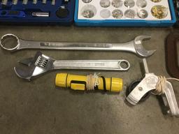 Collection of tools: Sea Fit multi tool kit, Clinch Fast kit, socket wrench set, etc