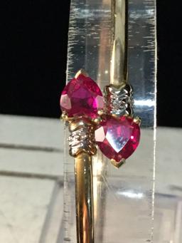 14K yellow gold bracelet w/ heart shaped rubies @ 3.6 grams