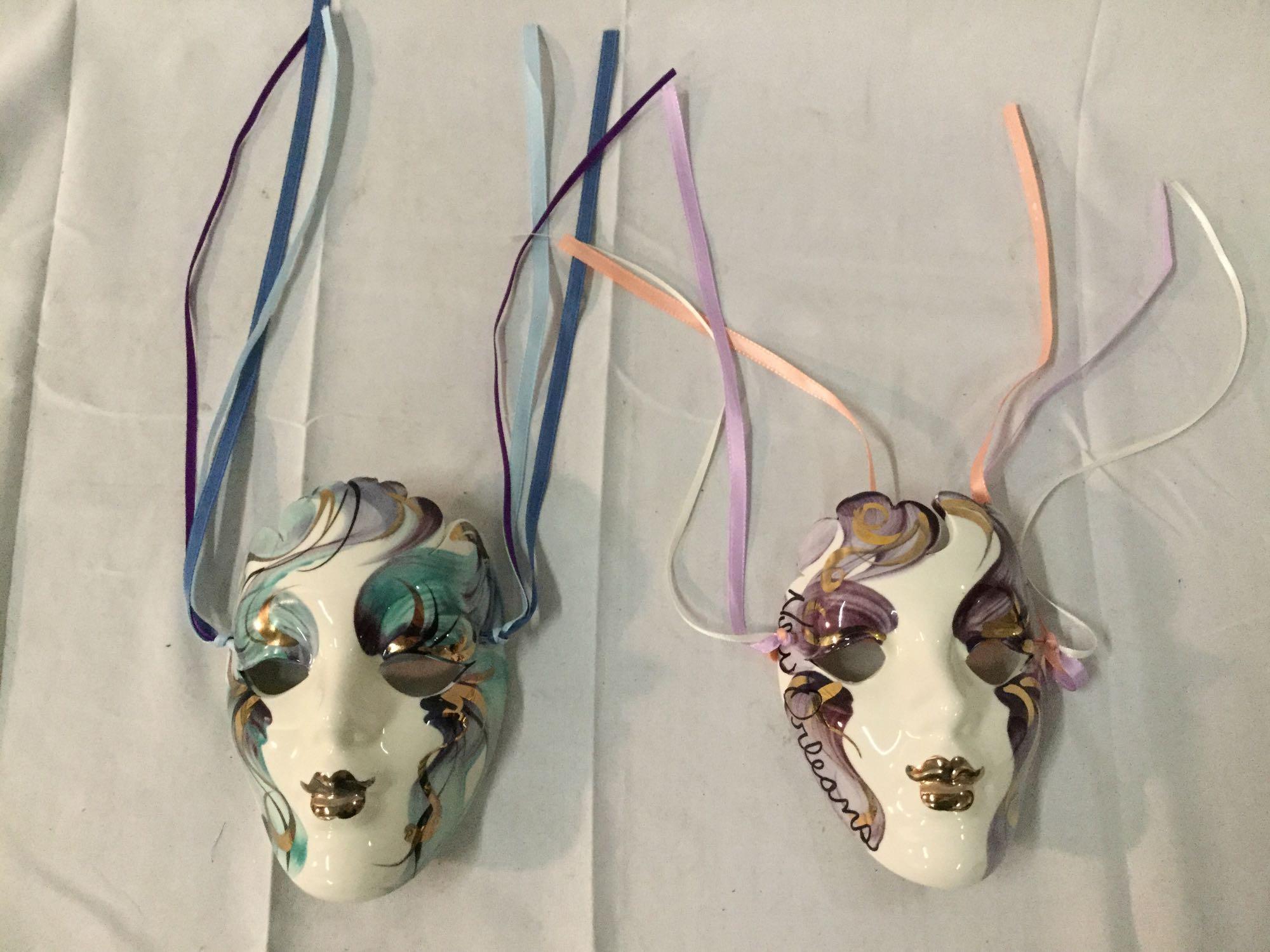 Pair of New Orleans hand painted porcelain masks with ribbons - signed by the artist as is