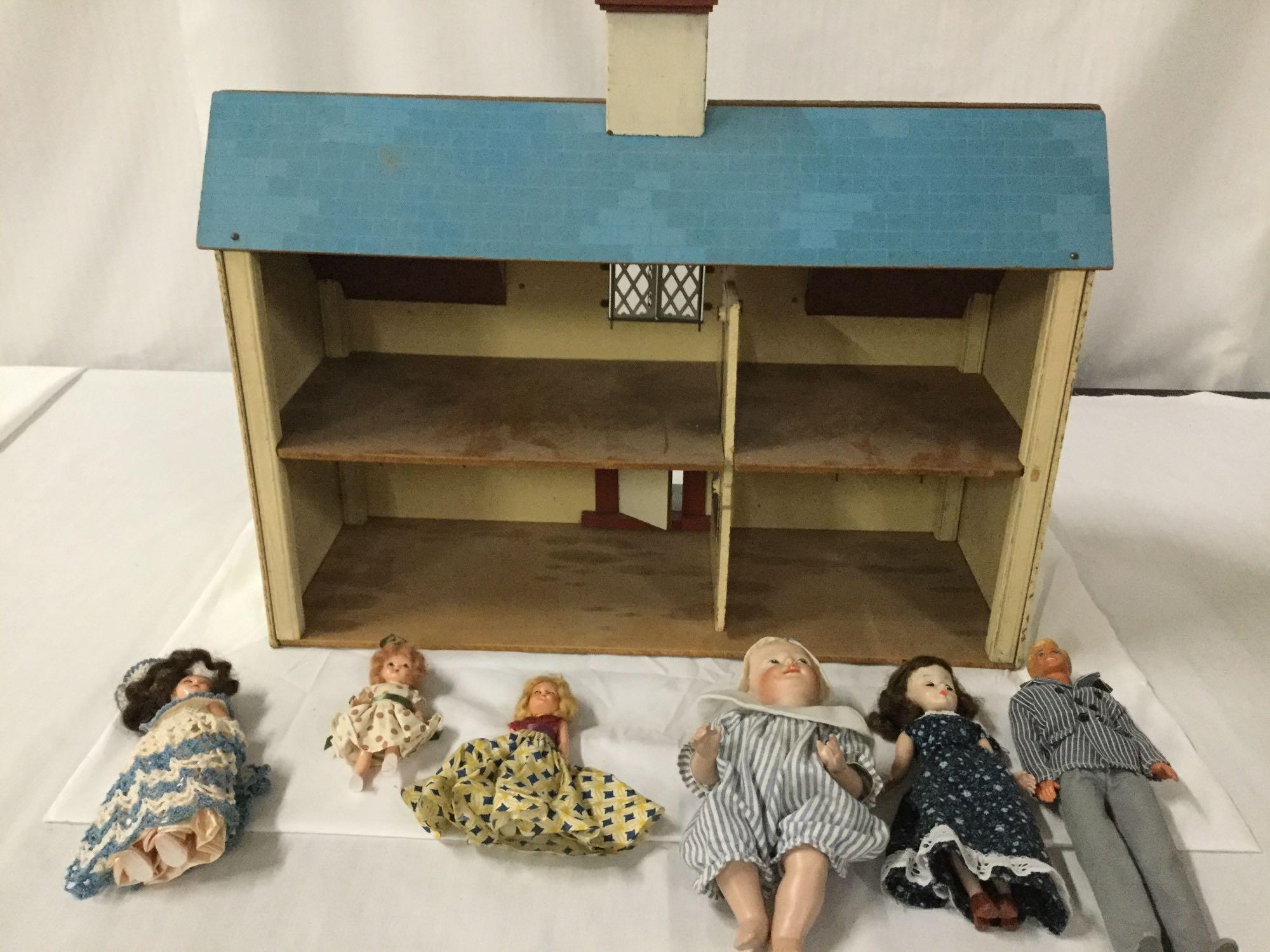 Vintage doll house with 6 vintage dolls includes Mattel Ken doll