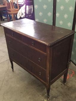 Antique 4 drawer deco walnut? dresser on casters with ring pulls