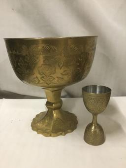 Selection of 12 etched brass mugs, tumblers, and chalice/elevated bowl