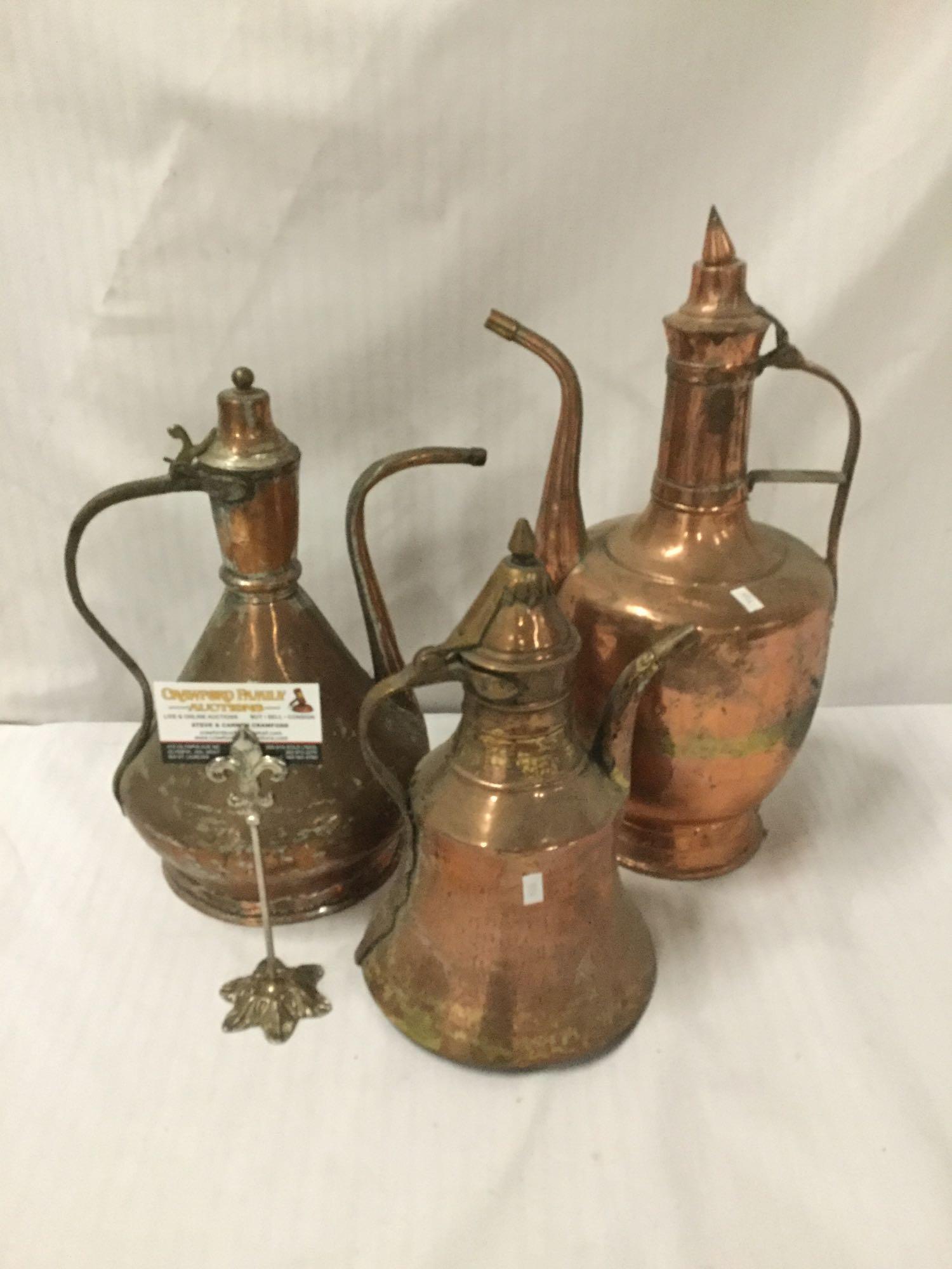 Collection of 3 antique hammered single handled copper ewers