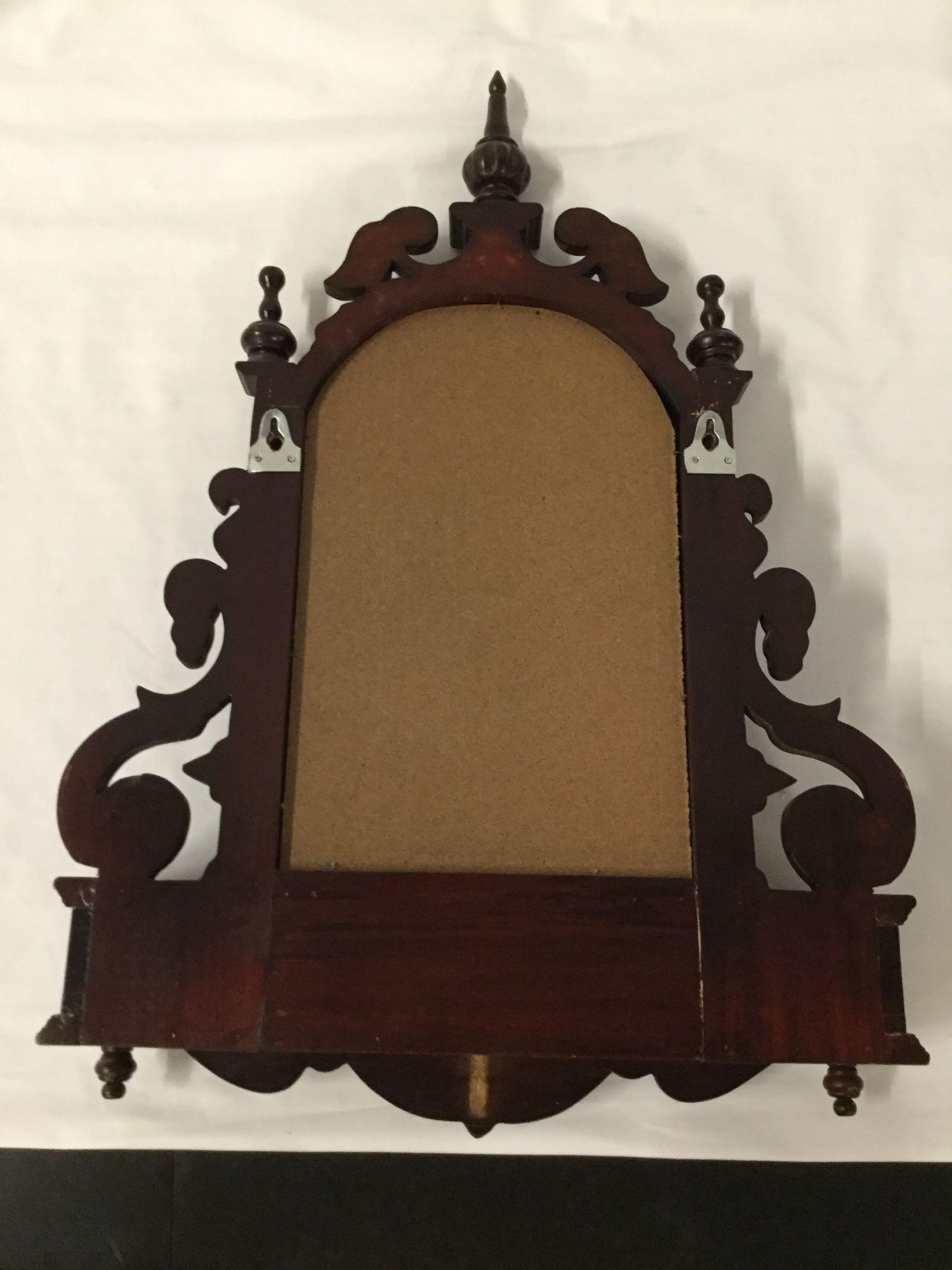 Antique renaissance revival style carved wall mirror with shelf and 2 small drawers