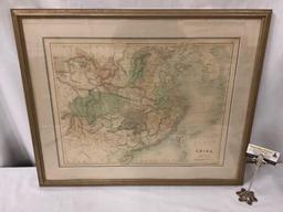 Professionally framed tinted map of mainland China drawn and engraved by J. Bartholomew