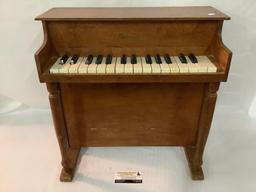 Doll size Schoenhut wooden toy piano, actually plays, approx 20x20x10 inches.