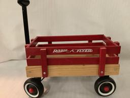Vintage Radio Flyer doll size red pull wagon, wood and plastic approx 24x8x8 inches.