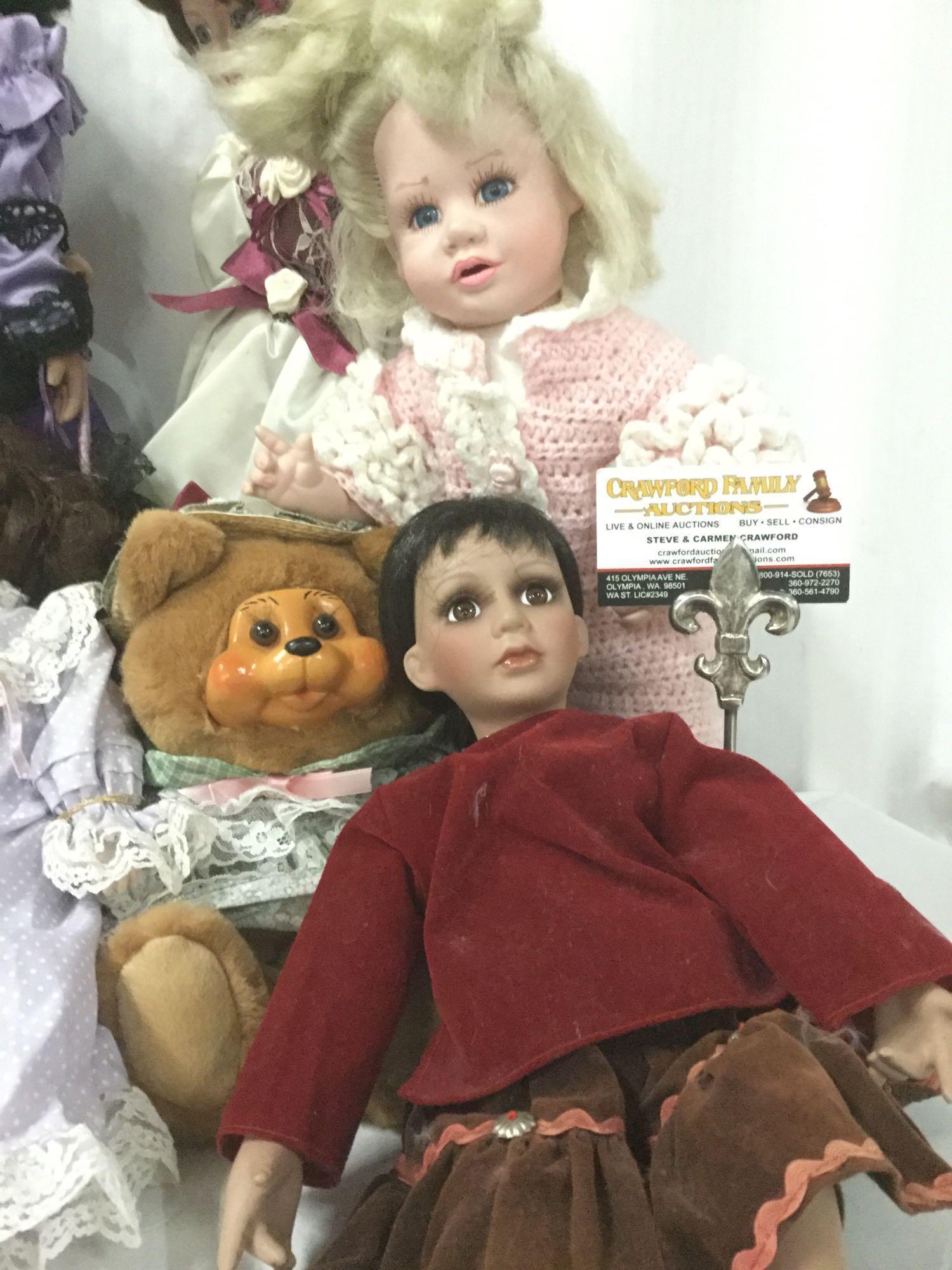 Ten porcelain, vinyl, and composite dolls from makers like Seymour Mann, Brinns, JMBJ, Hamilton