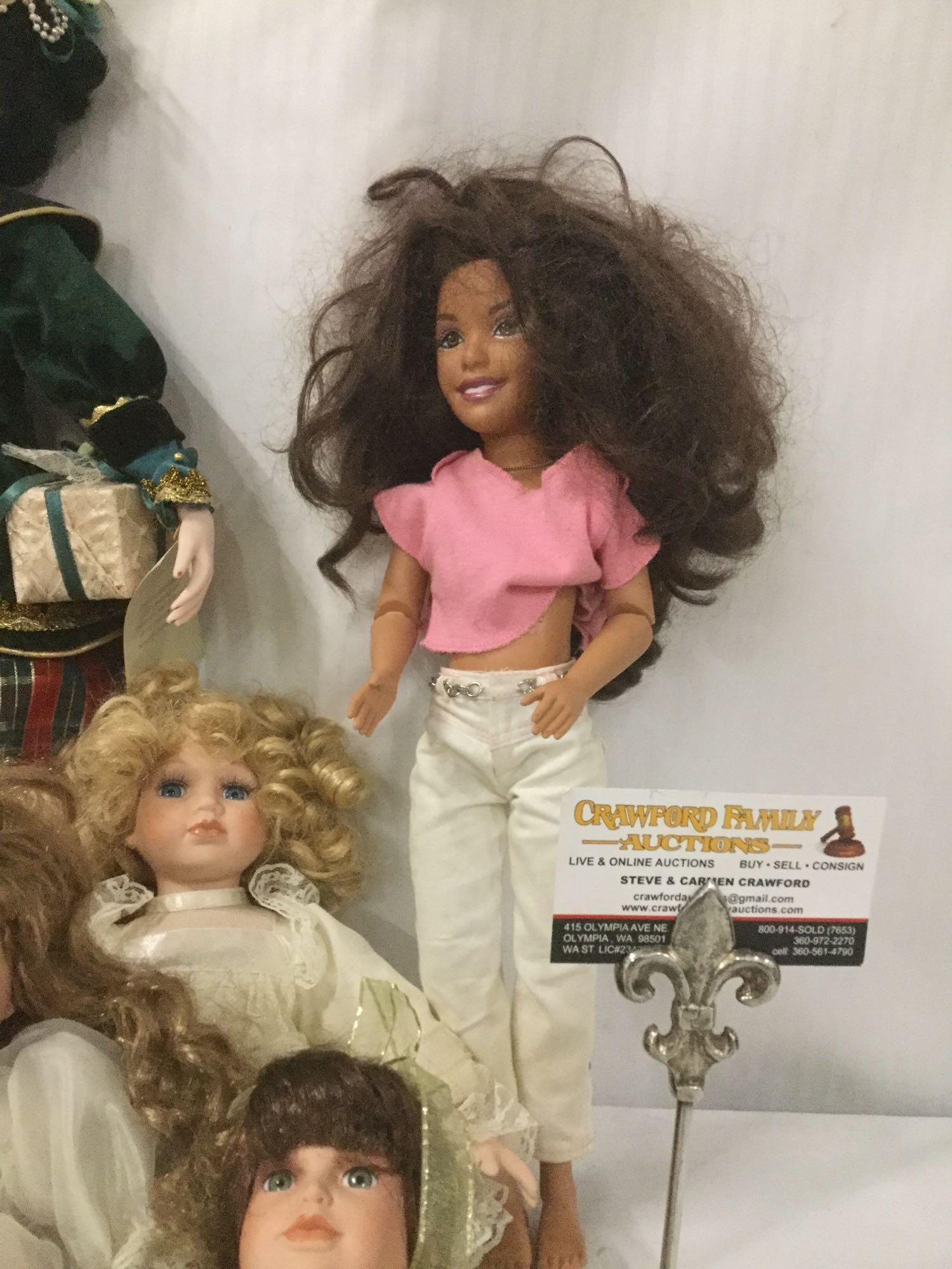 Twelve porcelain, vinyl, and composite dolls from Mattel, Court of Dolls, and others. JRL