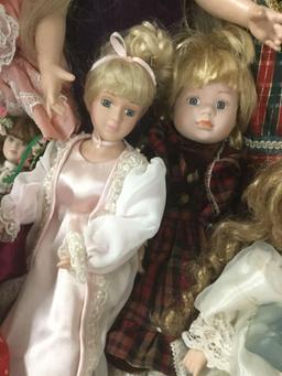 Twelve porcelain, vinyl, and composite dolls from Mattel, Court of Dolls, and others. JRL