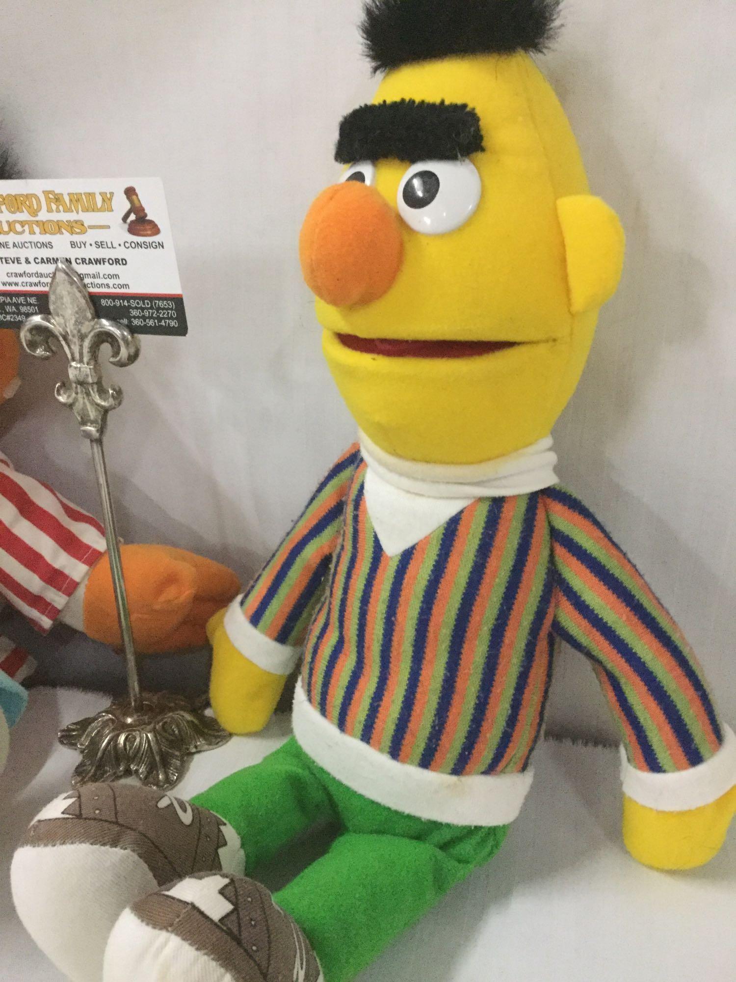 Bert and Ernie Sesame Street plush toys from Tyco. Ernie has a voicebox that is tested and working.
