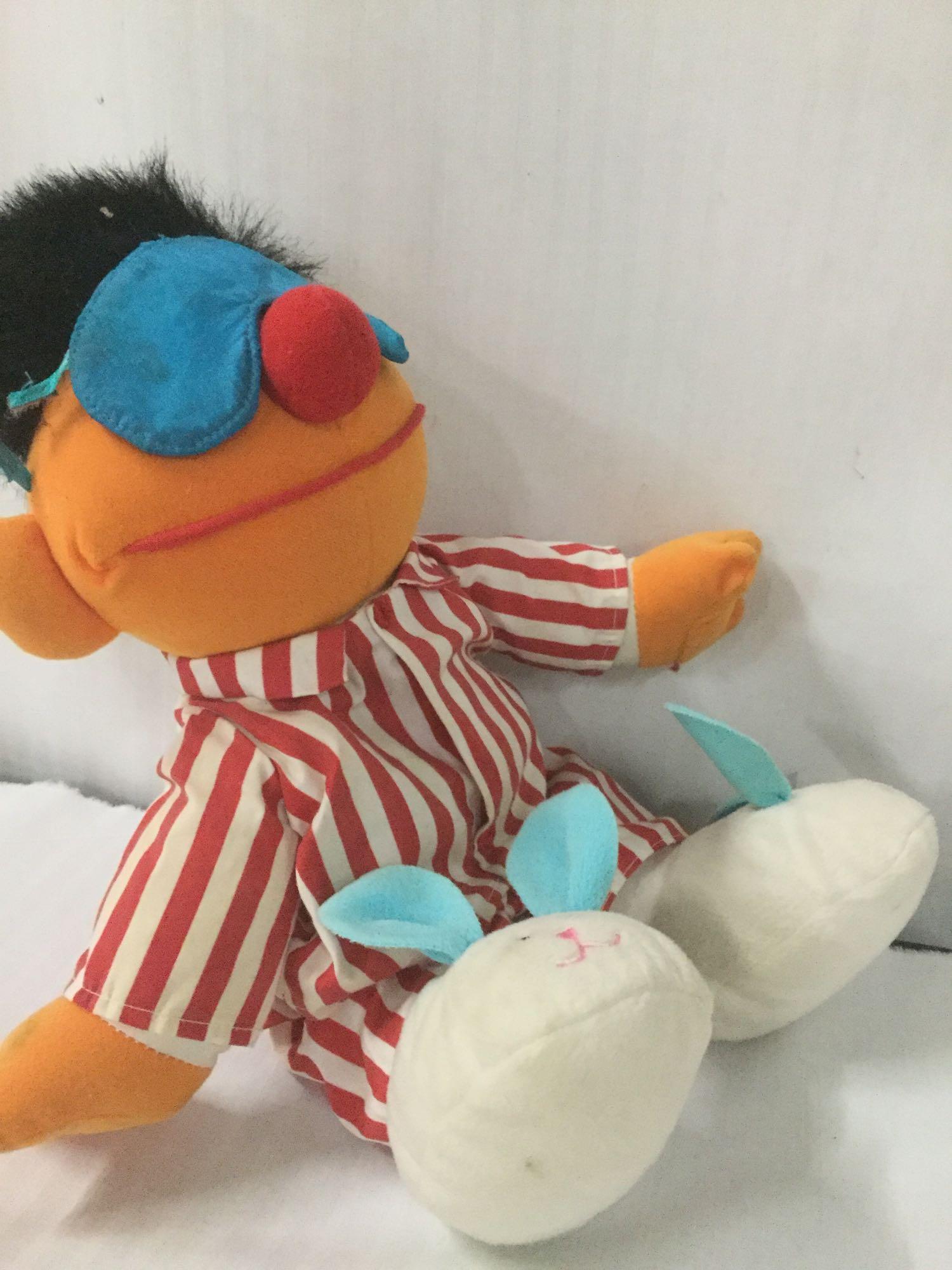 Bert and Ernie Sesame Street plush toys from Tyco. Ernie has a voicebox that is tested and working.