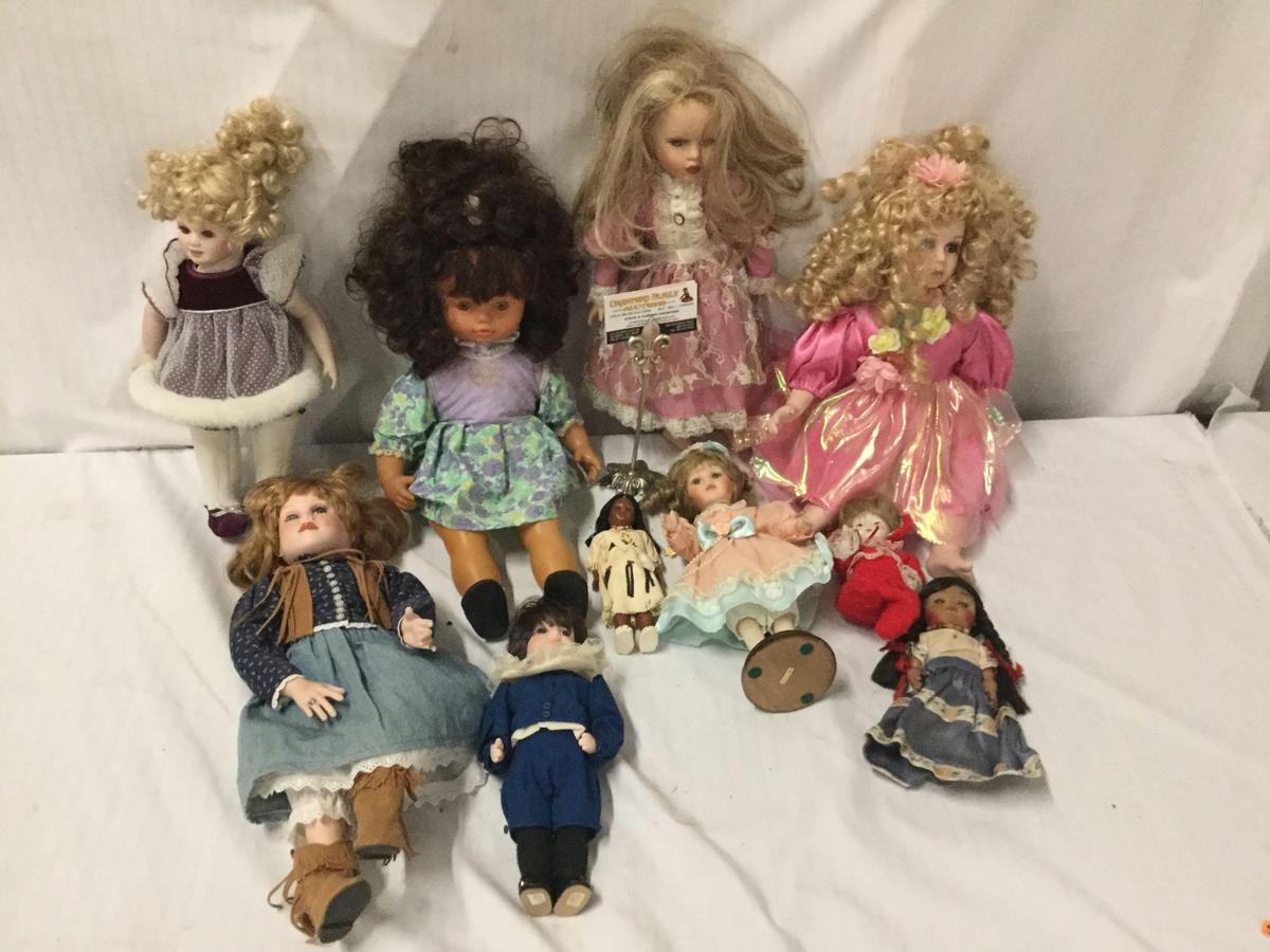 10x vinyl, composite and porcelain dolls. King state and more. Largest doll measures approximately