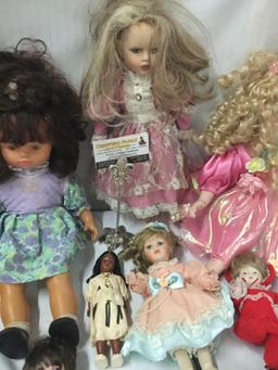 10x vinyl, composite and porcelain dolls. King state and more. Largest doll measures approximately