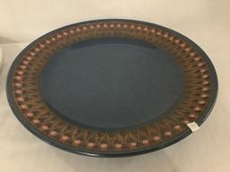 Pair of two circular handmade ceramic serving plates by Seattle pottery artist - one is signed