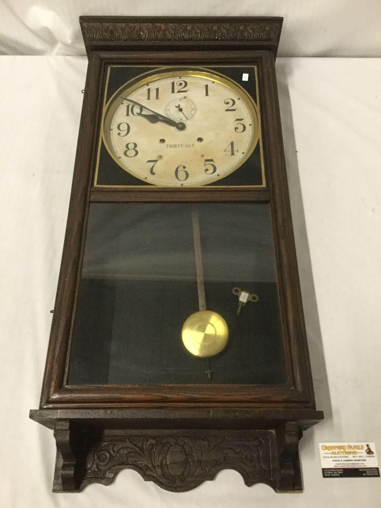 Antique Thirty Day wall clock by Waterbury Clock Co - shows some wear as is