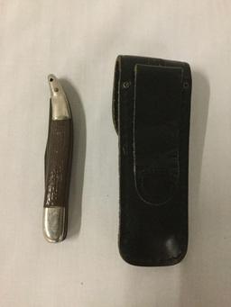 Lot of 4 small pocket knives incl. German Buck Fish Knife, Schrade USA Uncle Henry, and more