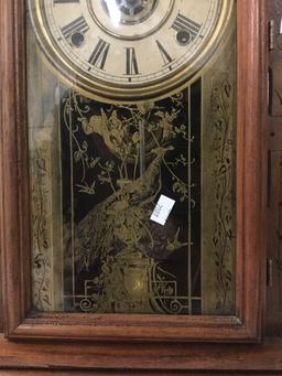 Antique eastlake period ornate mantle clock, time strike w/ peacock design glass front