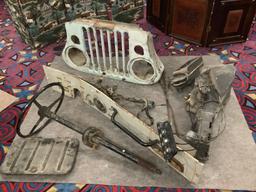 Lot of vintage Willys Jeep multipurpose passenger vehicle parts; grill, steering wheel, dash w/ key,