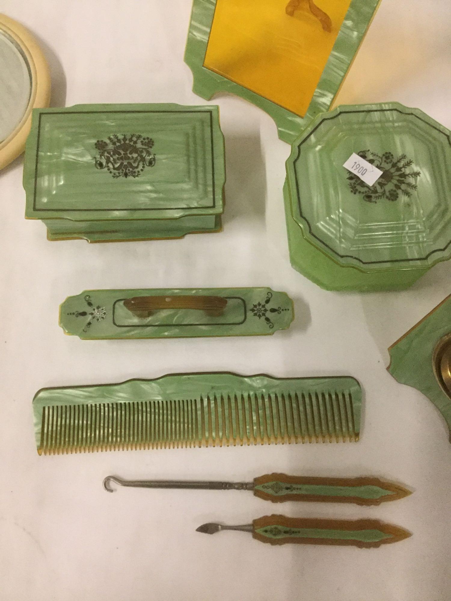 Antique art deco bakelite vanity set incl. frame, clock, comb, picks, mirror