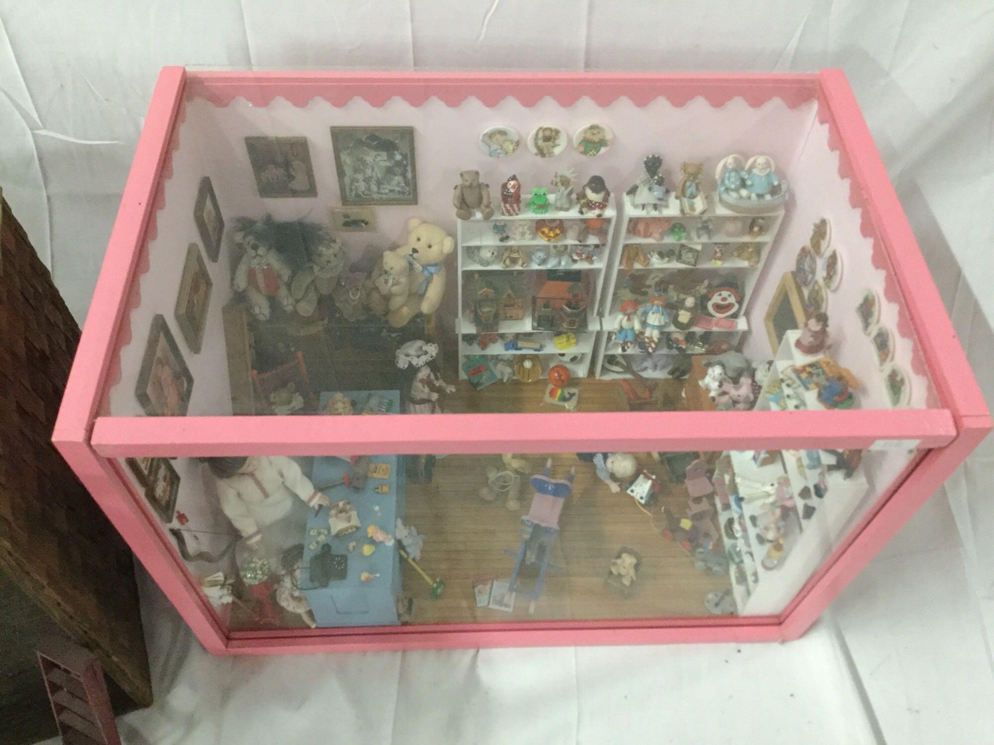 Miniature toy store window box display with doll figures plus doll sized workshop w/ tools