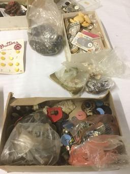 Large lot of buttons and some other misc. craft items, approx. 16x12x10 inches.