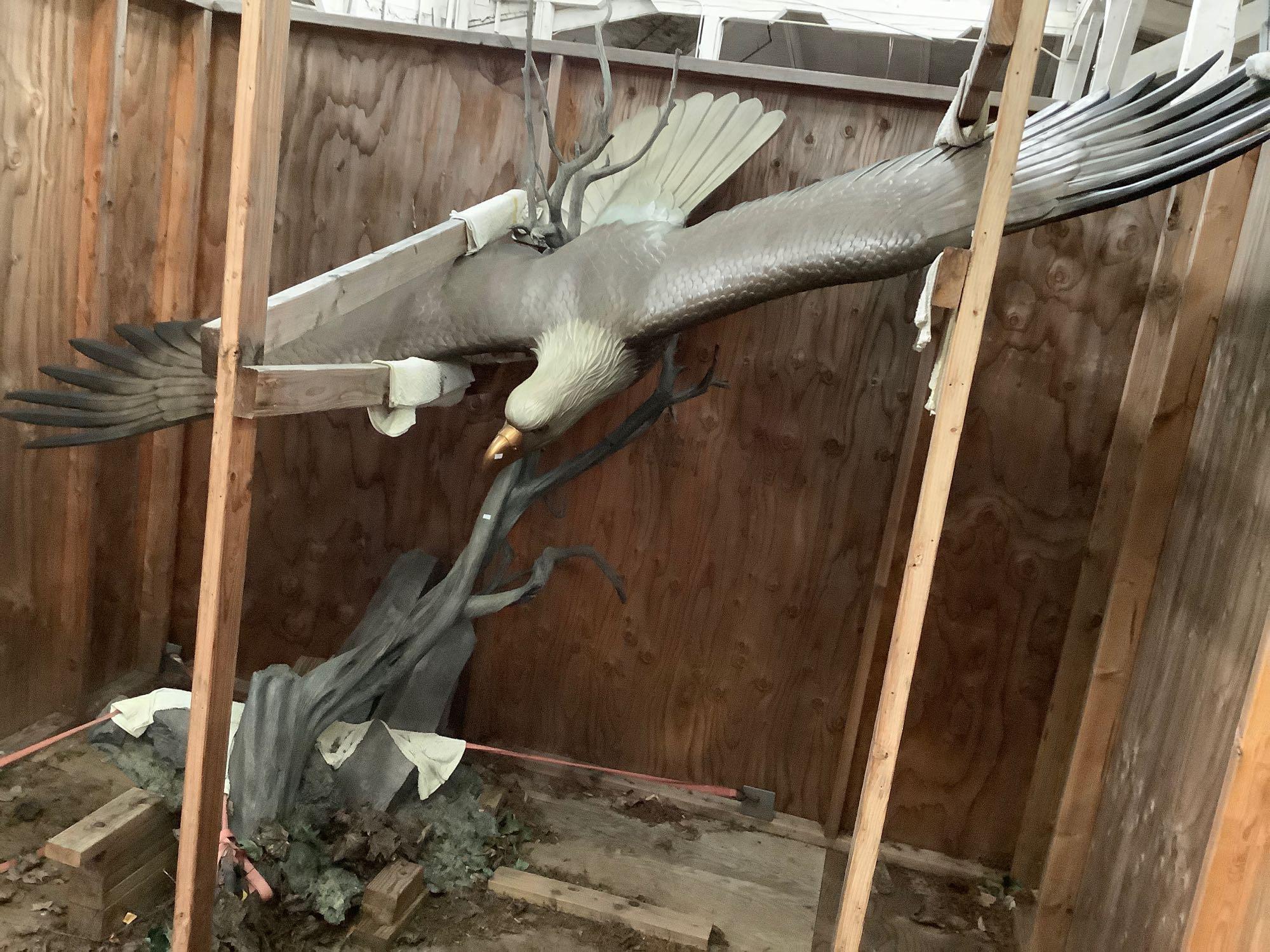 Massive bronze Bald Eagle statue soaring over a tree with cement base by Steven Parks - see desc