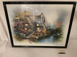 Framed print of cottage with flowers and swans in pond by Andres (?) approx 29.5 x 24 inches