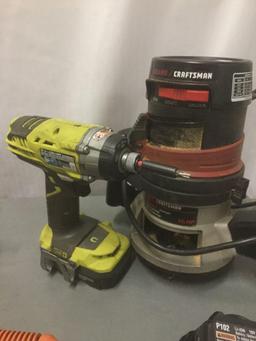 Four power tools and two battery charging stations , Ryobi, Craftsman , Ridgid see description