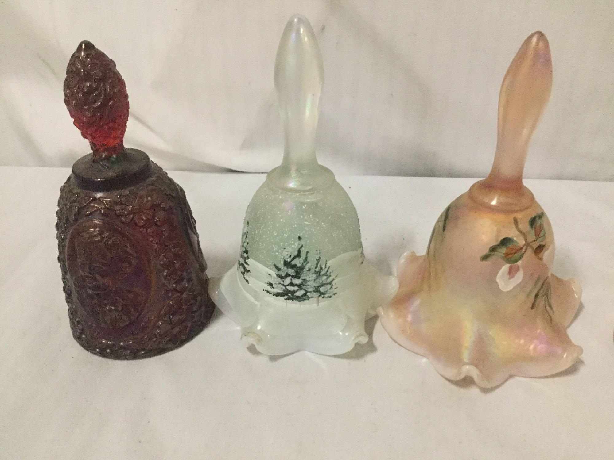 Collection of 15 vintage glass and stoneware bells. 7 Fenton glass pieces, 3 carnival glass, 6 hand