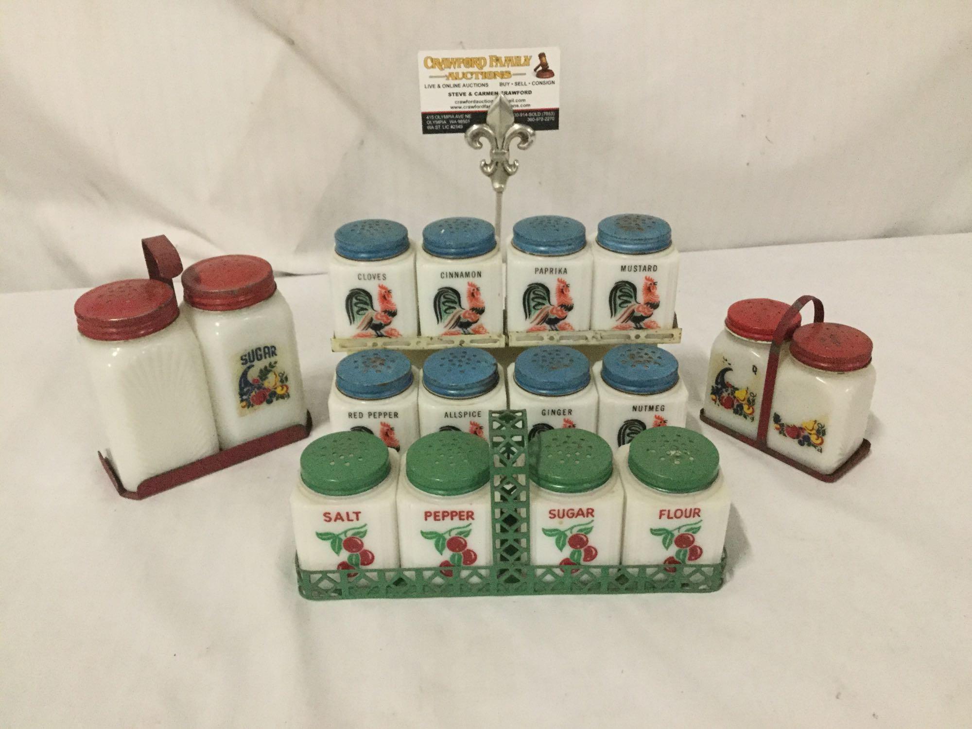 Collection of 30s and 40s Tipp City glass spice shakers with metal carrying stands. Rooster,