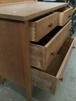 Vintage wood dresser with mirror, wheels and 4 drawers by Carman Manufacturing Co. (Portland, OR),