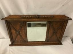 Antique wall hanging wood frame mirror, approx 36 x 23 x 2 inches.