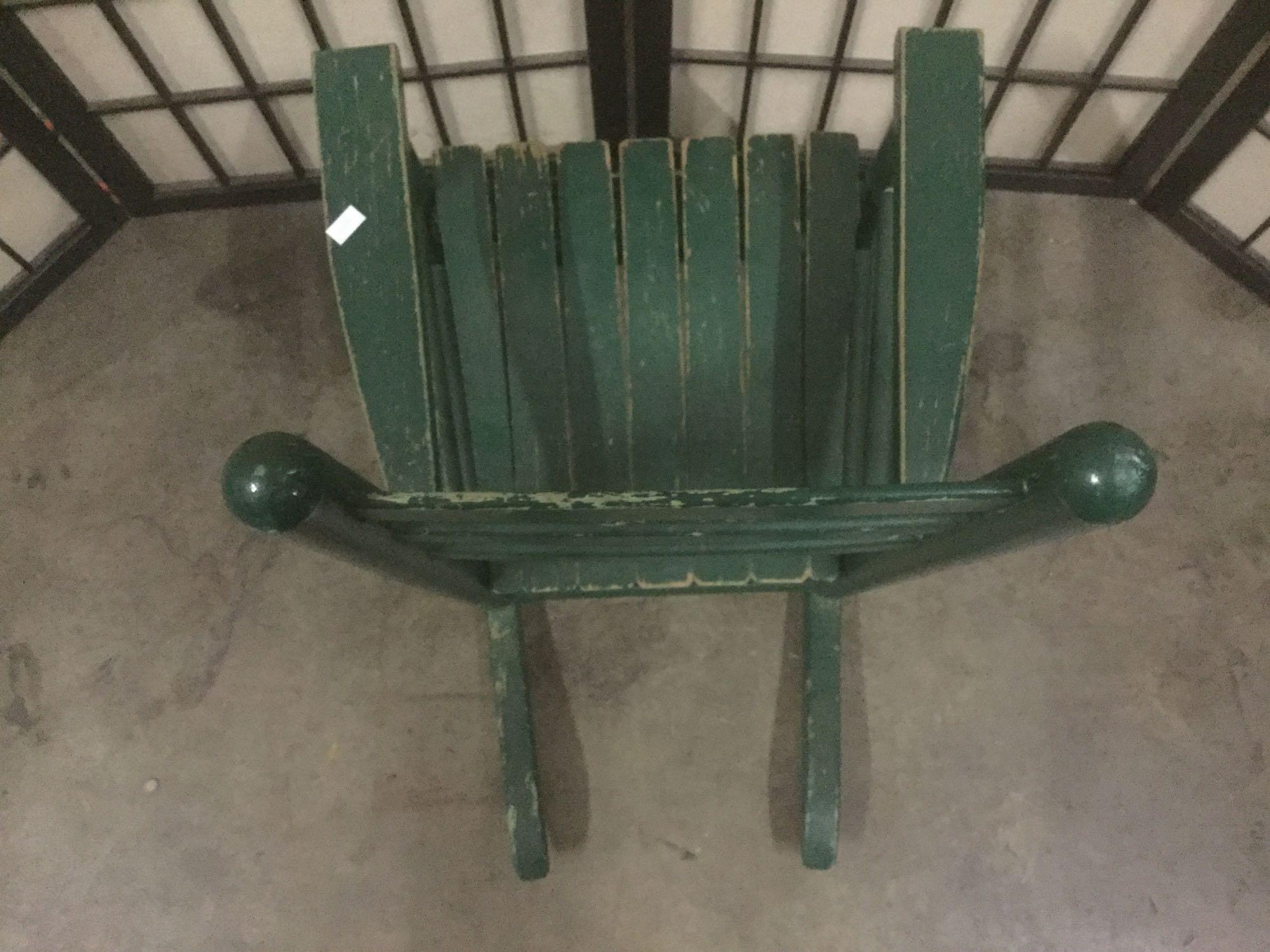 Green vintage childs rocking chair, Tanner printed on backrest, approx. 14x22x24 inches.