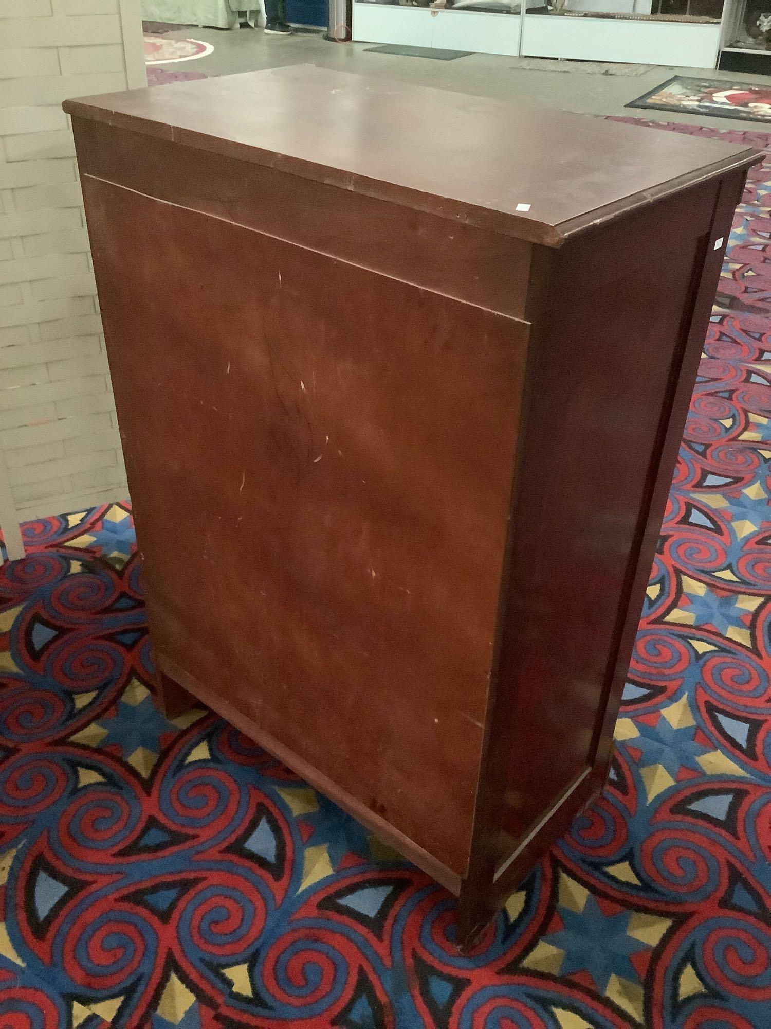 Vintage wood dresser with 4 drawers, missing one drawer pull, approx 30x17x45 inches.