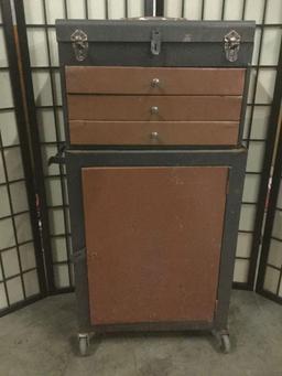 Metal three drawer tool cabinet w/casters, approx. 22x14x41 inches.