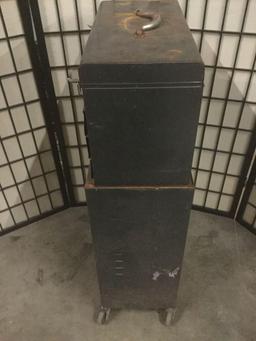 Metal three drawer tool cabinet w/casters, approx. 22x14x41 inches.
