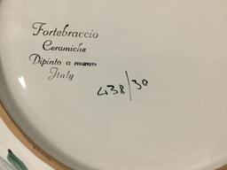 Collection of 14 Fortebraccio...Ceramiche...ceramic plates and one serving bowl