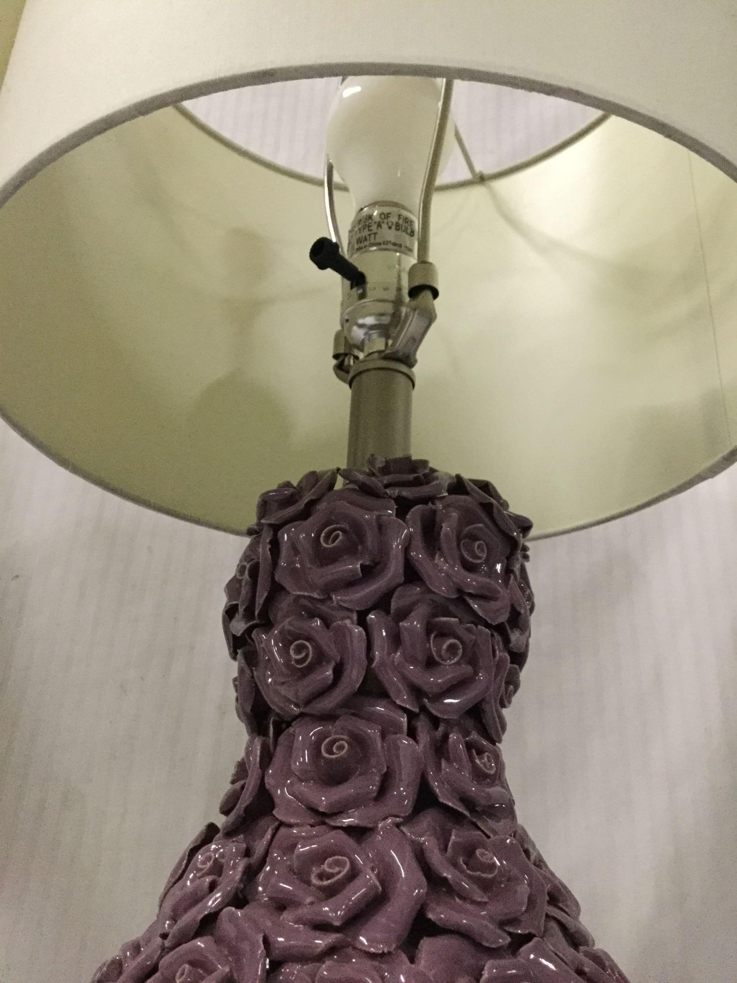 Pair of purple ceramic rose lamps.