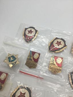 Former Russian KGB employee recognition badges.