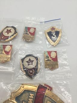 Former Russian KGB employee recognition badges.