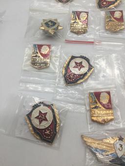 Former Russian KGB employee recognition badges.