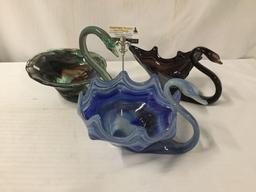 Set of three vintage Murano glass swan bowls. The largest measures approx 11x9x9 inches.