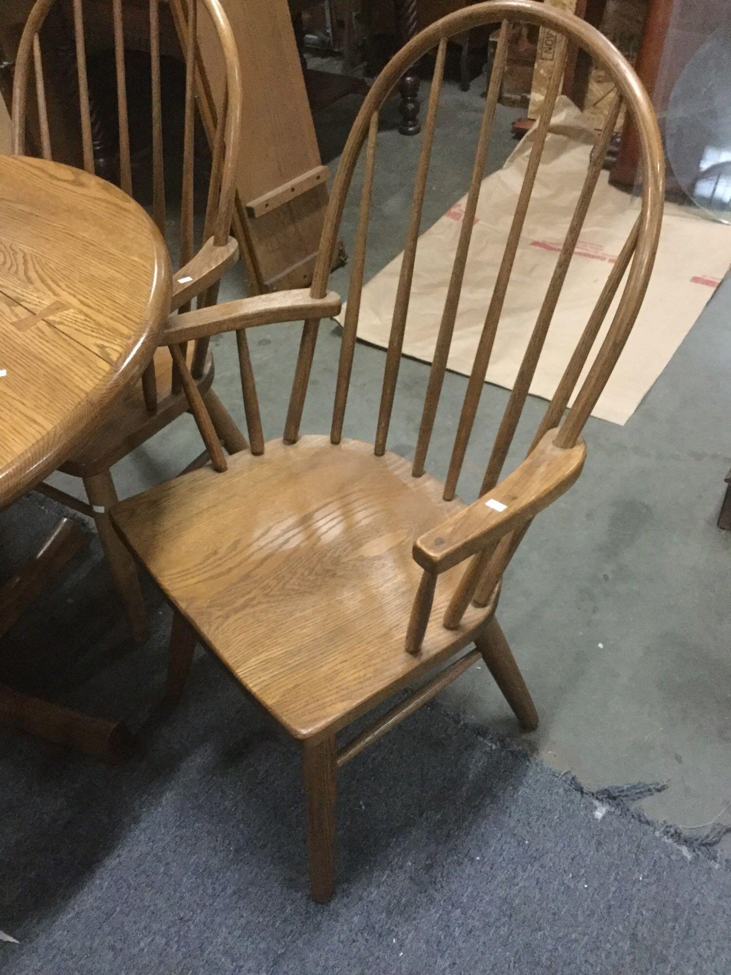 Vintage Conant Ball Furniture Co. round oak table with four chairs and two leaves. approx 44x44x30