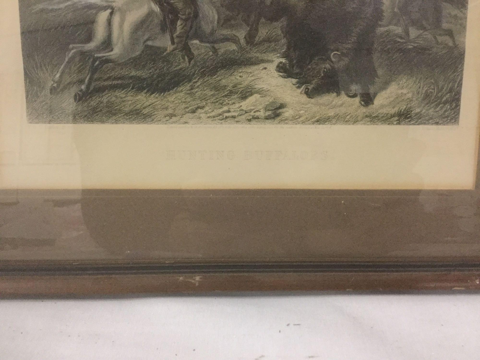 Antique hand tinted engraving of Hunting Buffaloes by Francis Hall. approx 14.5x11.5 inches.
