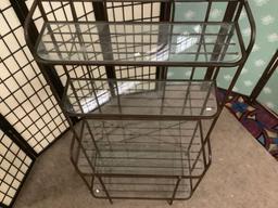 Metal & glass shelf four-tiered bakers rack / display shelf, approx. 31x16x72 inches.